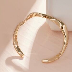 Gold tone cuff bracelet